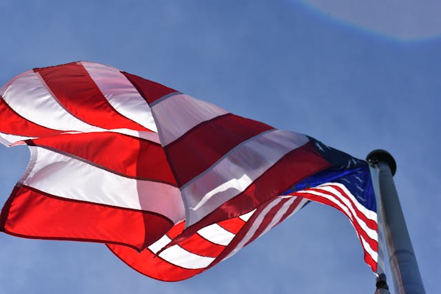 A waving American flag offers a respectful and patriotic tribute for cremation services Columbus, OH